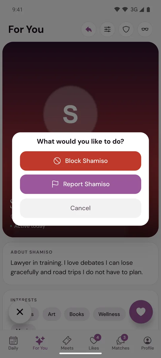 The sheet What would you like to do, with a Block button and a Report button